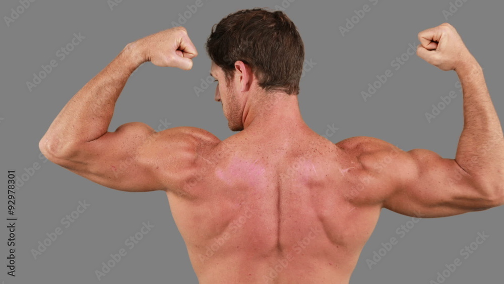 Muscular man flexing his muscles Muscular man flexing his muscles