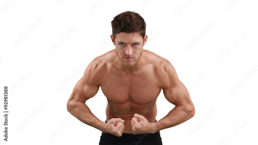 Muscular man flexing his muscles Muscular man flexing his muscles
