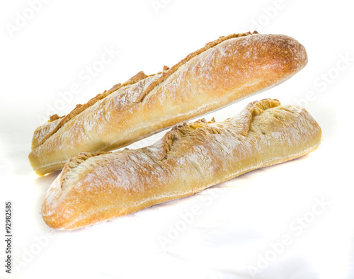 traditional baguette on white background