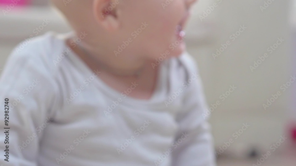 Crawling baby boy laughing and smiling Crawling baby boy laughing and smiling