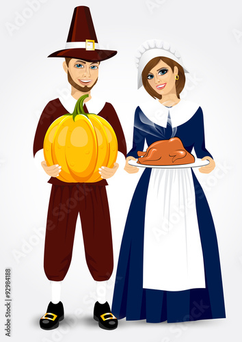 pilgrim couple holding a roast turkey and pumpkin