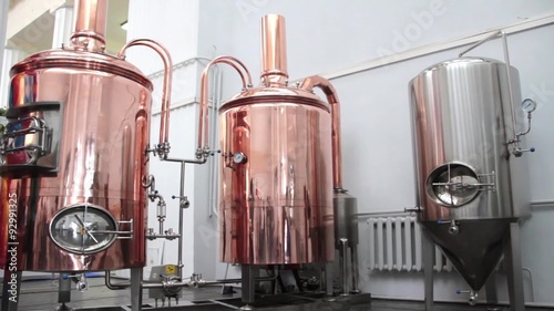 Copper tuns for brewing at a brewery photo