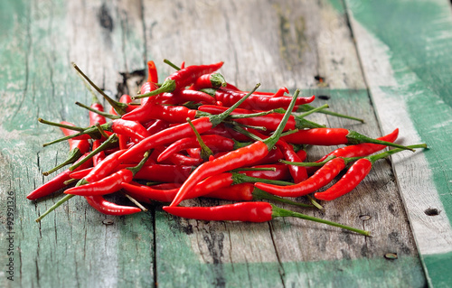 Red Chili pepper on wooden table