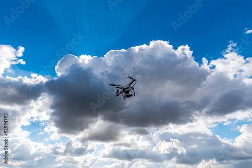 Small drone and dark clouds