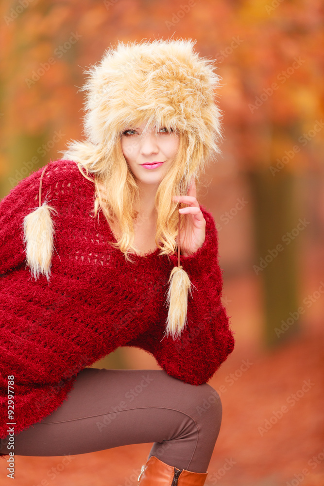 Portrait of pretty fashion woman in fur winter hat Portrait of pretty fashion woman in fur winter hat
