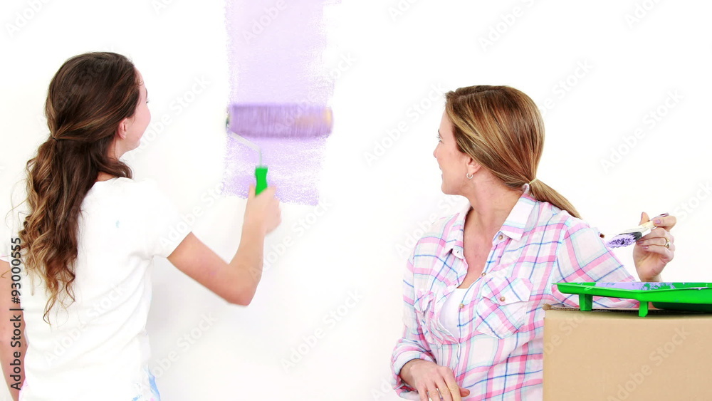 Mother and daughter redecorating together Mother and daughter redecorating together