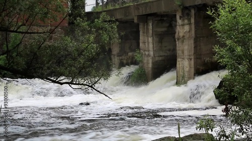 Water flow under the bridge photo