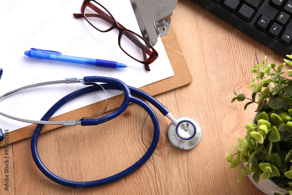 Stethoscope on laptop keyboard. Concept 3D image Stethoscope on laptop keyboard. Concept 3D image