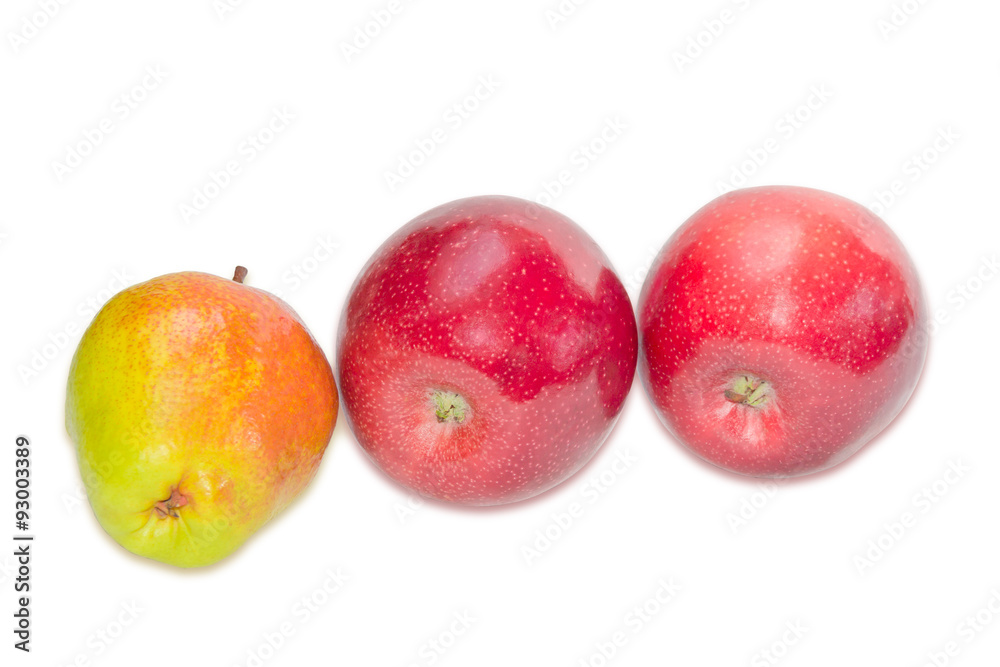 Pear Bartlett and two apple on a light background Pear Bartlett and two apple on a light background