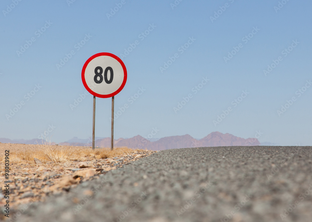 Speed limit sign at a desert road in Namibia