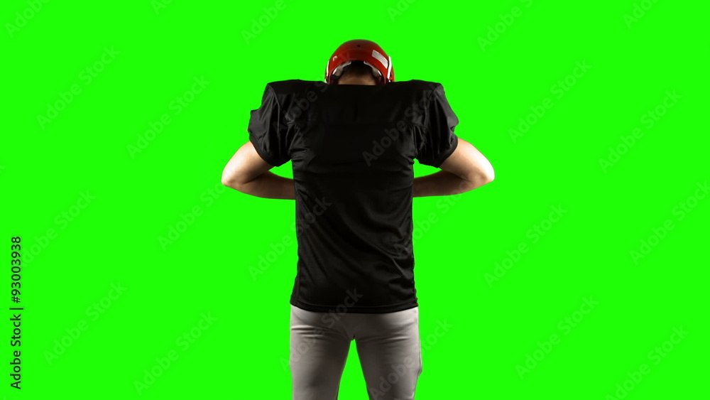 American football player on green screen American football player on green screen