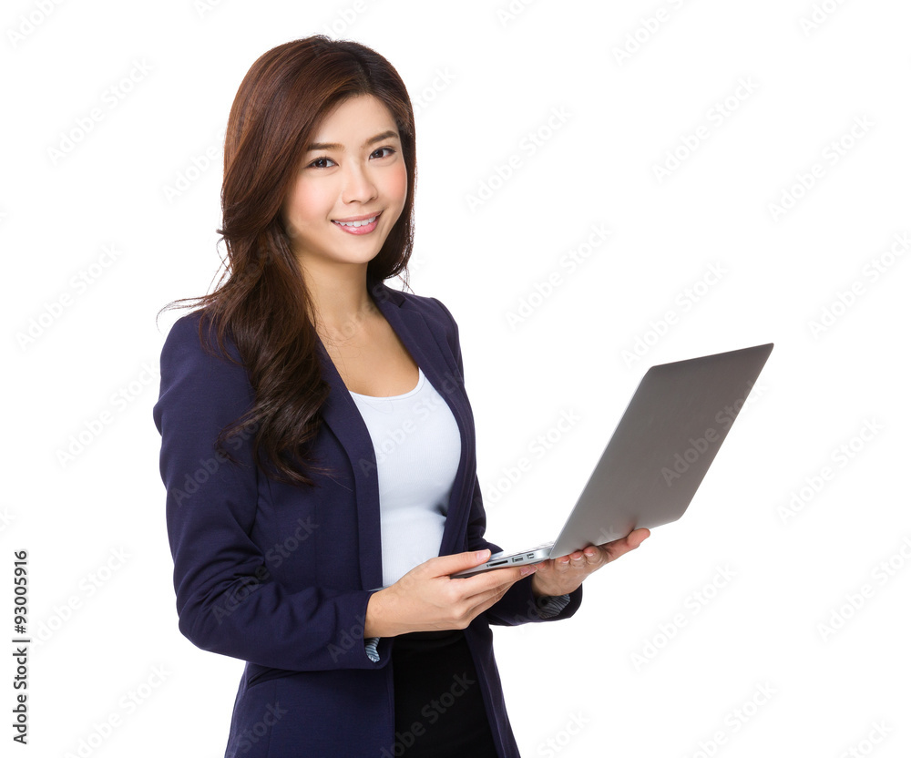 Young asian businesswoman use of the laptop computer Young asian businesswoman use of the laptop computer