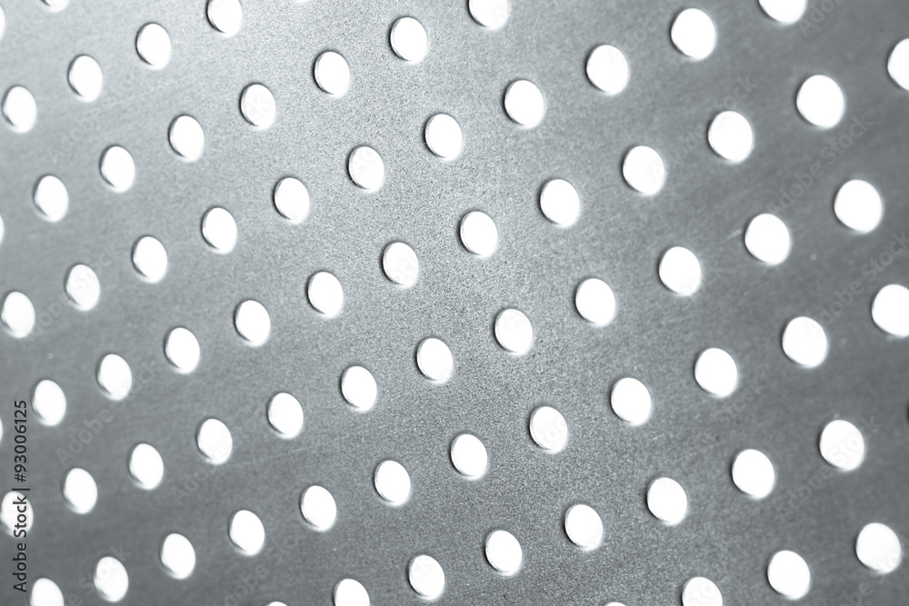 Galvanized perforated steel. Pegboard.

