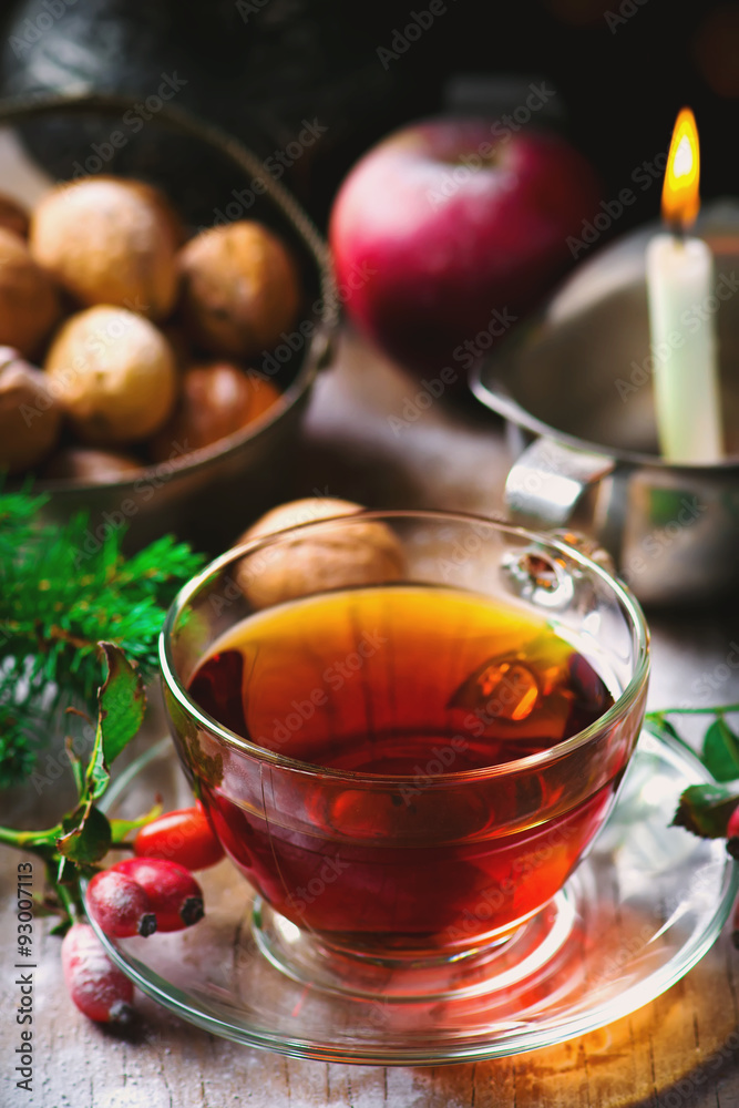 cup of briar tea on a Christmas rustic background. cup of briar tea on a Christmas rustic background.
