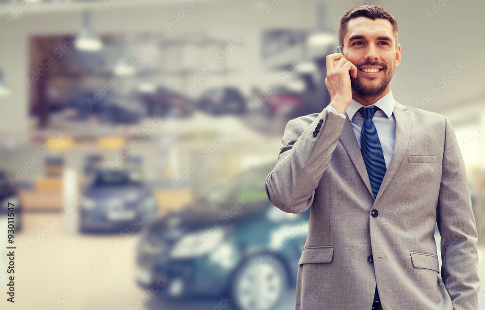 smiling businessman talking on smartphone smiling businessman talking on smartphone