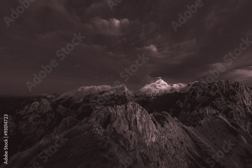 Sunrise in the mountains. Early morning as viewed from the top of Visevnik hill with vast landscape below.