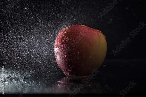 Apple in spray