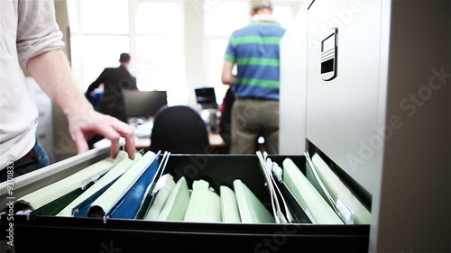 The Office: returning a file to a filing cabinet