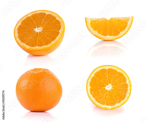 Oranges, cut half and full balls on white background.