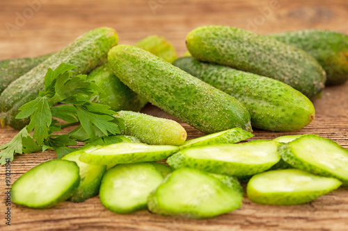 Fresh pickle cucumbers on wooden table