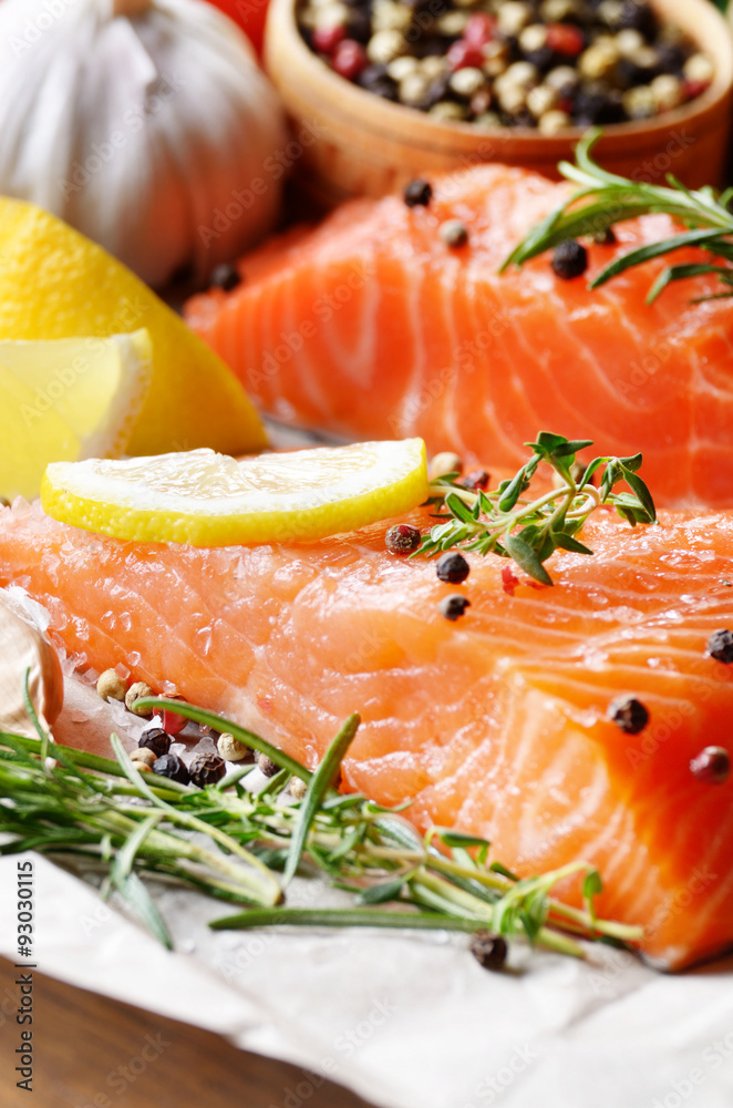 Raw salmon on baking paper Raw salmon on baking paper