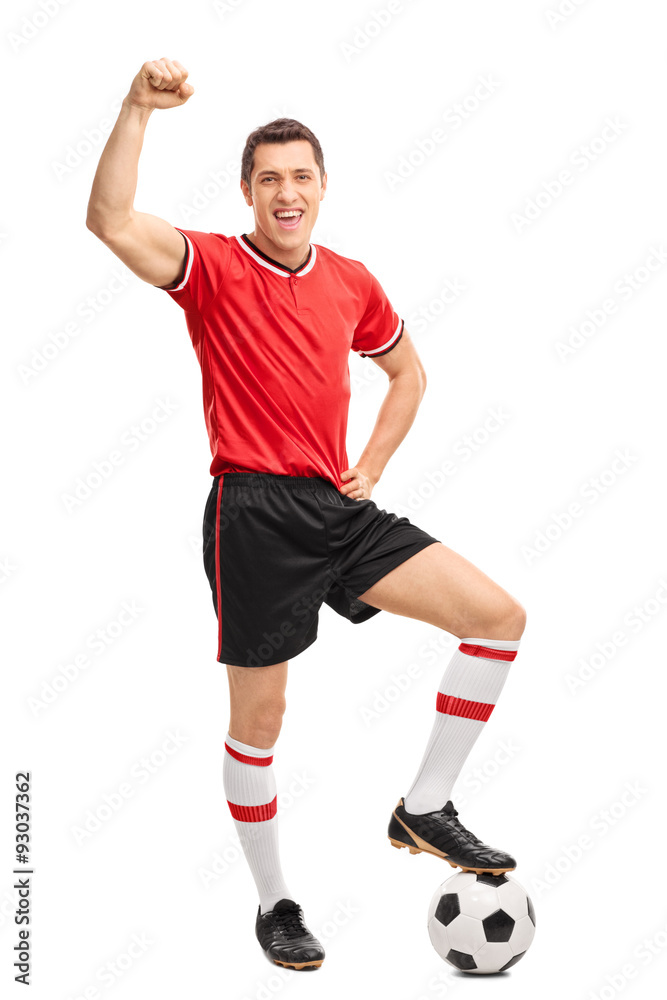 Joyful football player gesturing happiness Joyful football player gesturing happiness