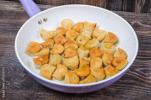 Fried dumplings in the pan