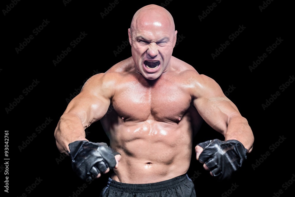 Aggressive fighter flexing muscles Aggressive fighter flexing muscles