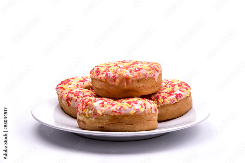 Stack of iced ring donuts