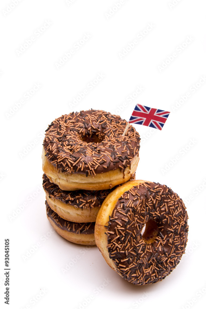 Stack of chocolate donuts with a British flag foto de Stock Adobe Stock