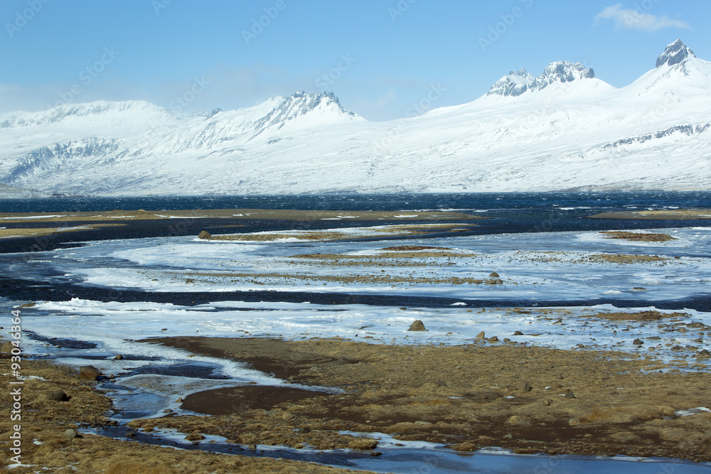 Snow-covered volcanic mountain landscape