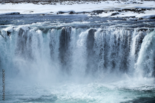 Closeup of frozen waterfall Godafoss, Iceland