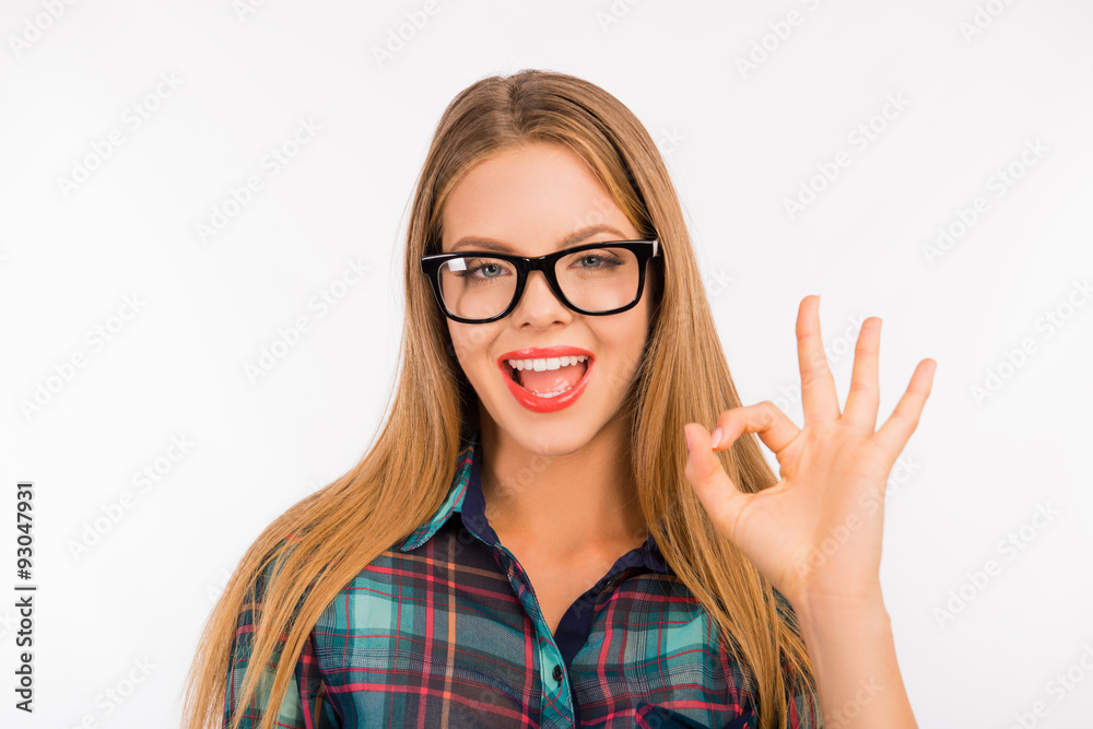 Sexy girl with glasses gesturing OK Sexy girl with glasses gesturing OK