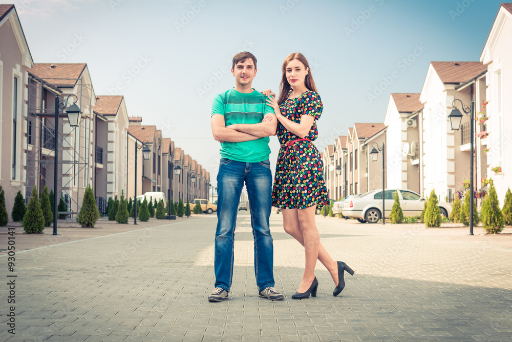 young couple at uptown street
