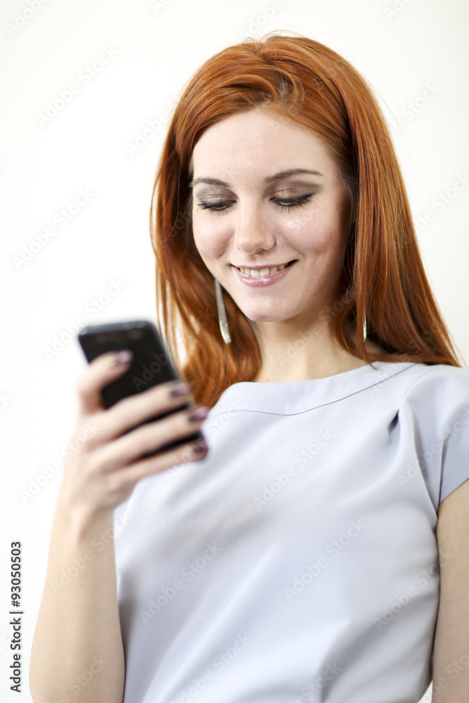 Red hair woman with cellphone Red hair woman with cellphone