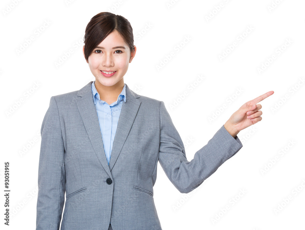Businesswoman with finger point aisde Businesswoman with finger point aisde