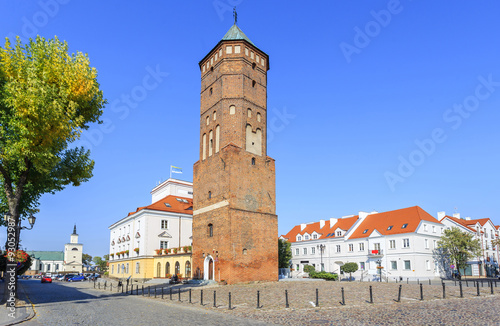 The old town of Pultusk on the Narew - a view of the market and the renaissance town hall ( XVI century) with the gothic tower  photo