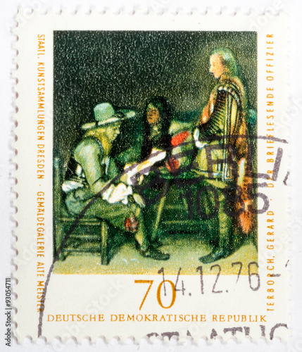 GDR - CIRCA 1976: A stamp printed in GDR (East Germany) shows image of artist Gerard Terborch "Interrogation of the officer", series, circa 1976