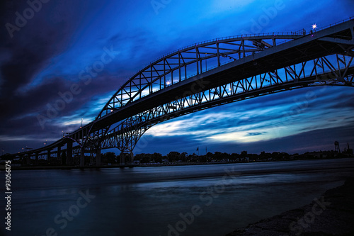 Fototapeta Naklejka Na Ścianę i Meble -  Blue Water Bridge at dusk in silhouette.