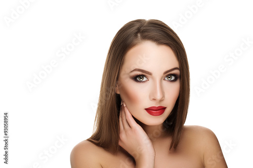 nice portrait of smiling young beautiful brunette woman with makeup and red lips. isolated photo 