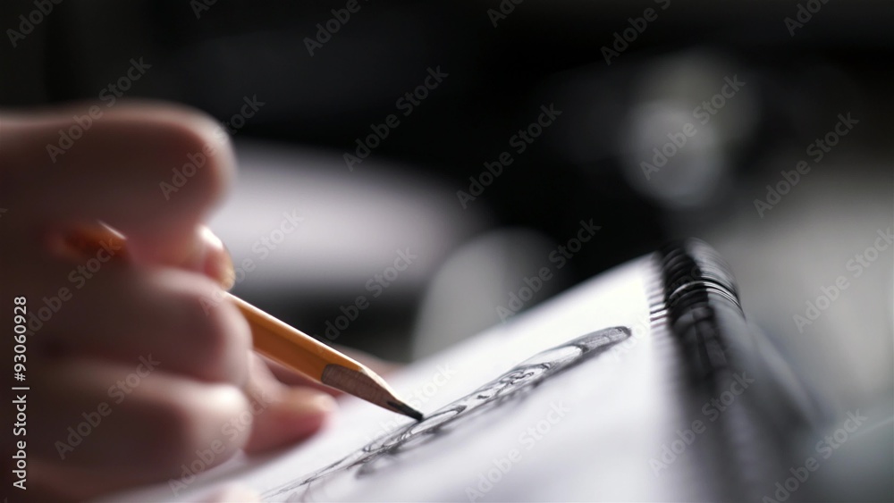 woman draws a sketch on christmas