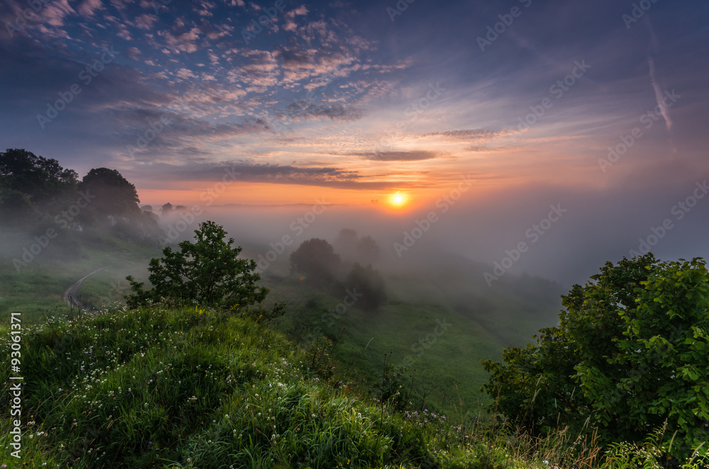 Sunrise over Vistula river valley covered with the mornings mists near Krakow, Poland
