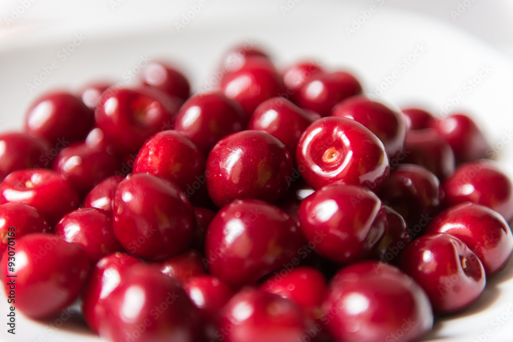 Bowl of red fresh cerries on a white background Bowl of red fresh cerries on a white background