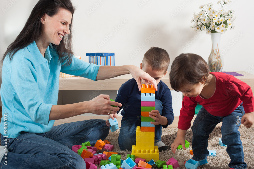 Obraz premium Family play with toys