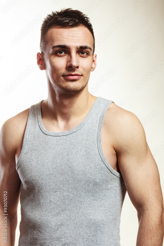 Handsome muscular sporty fit man portrait. Handsome muscular sporty fit man portrait.
