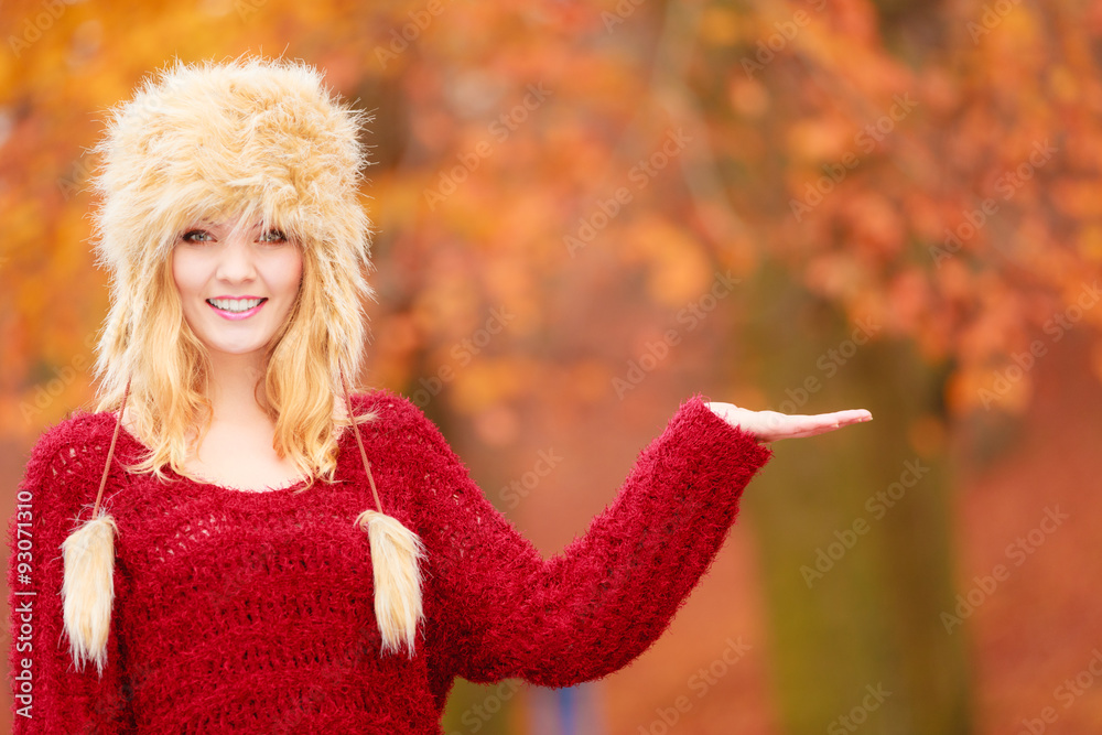 Pretty smiling woman in fur hat with copy space. Pretty smiling woman in fur hat with copy space.