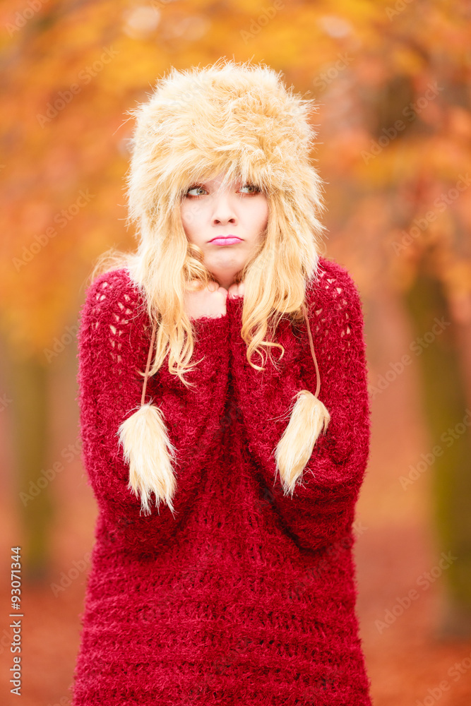 Pretty fashion woman in winter hat feeling cold. Pretty fashion woman in winter hat feeling cold.