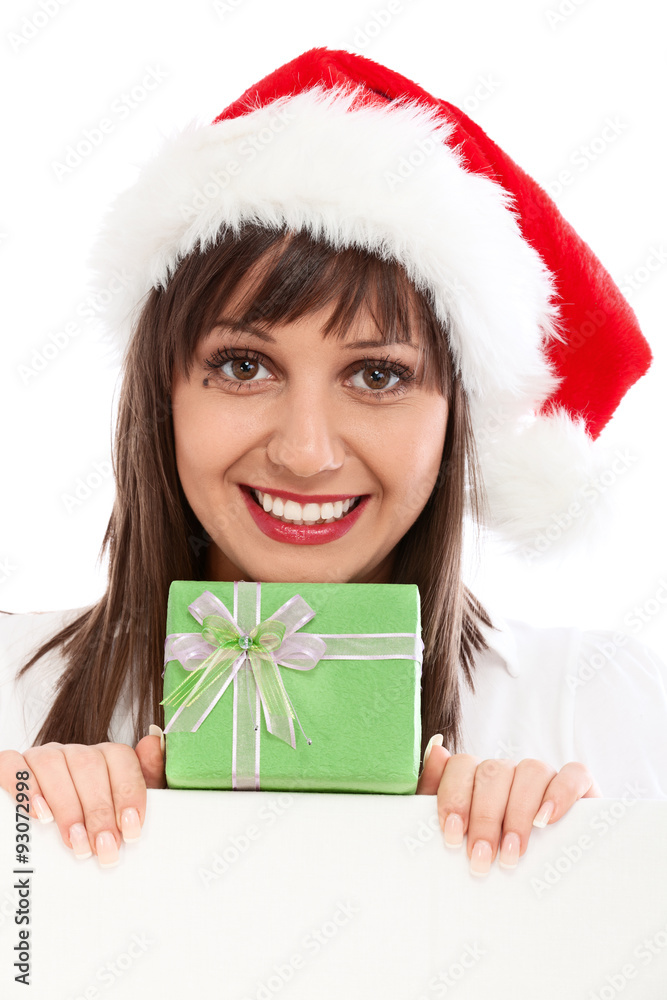 Young woman with santa hat and christmas gift Young woman with santa hat and christmas gift