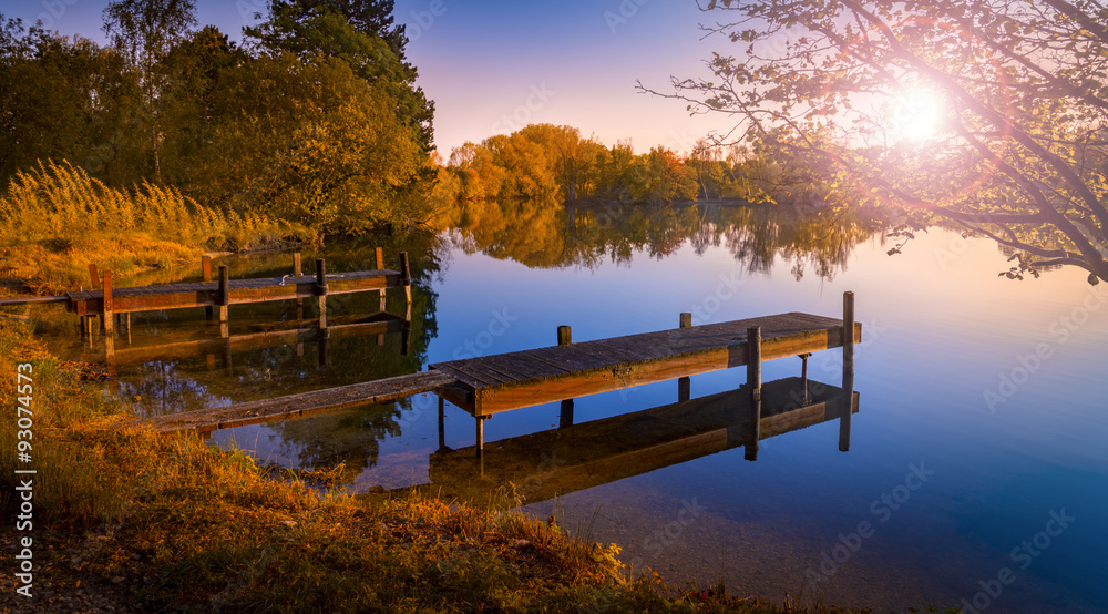 Wooden Jetty on a Becalmed Lake at Sunset Wooden Jetty on a Becalmed Lake at Sunset
