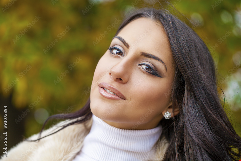 Portrait of young Italians in beige coat